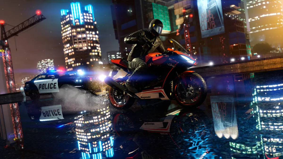 Motorcycle escaping a police car through neon-lit downtown streets